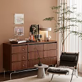 Decorative Ornament Set on Walnut Cabinet with Wall Art Table Lamp and Green Plant
