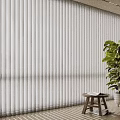 White Vertical Blinds in Interior Room with Green Plant and Small Wooden Stool