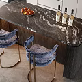 Modern Bar Counter With Black Marble Top Blue Velvet Stools And Wine Bottles