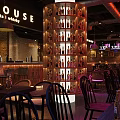 Industrial Bar Interior Design With Brick Walls Pendant Lights And Neon Signs