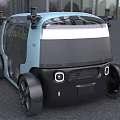 Light Blue Modern Urban Car With Large Windows And Black Accents