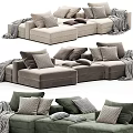 Modern Sectional Sofa With Beige Gray Green Upholstery Pillows And Throws