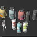 Washing Supplies With Colorful Bottles And Transparent Containers Holding Detergent Tablets On Dark Background