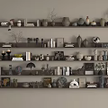 Stylish Layered Decorative Ornament Arrangement on Shelves with Vases Books Sculptures Plants and Photo Frames