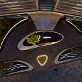 Modern Plaza Landscape Design With Curved Pathways Palm Trees And Water Features