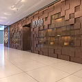 Bright Dessert Shop Interior Featuring Glass Display Cases Pastries Green Plants And Decorative Bicycle