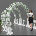 White Wedding Arch With Pink Fabric Decorations And Green Plants Near Standing Woman