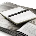 Collection of Open Books And Magazines With Stacked Layouts And Varied Pages