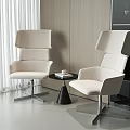 Modern Light Beige Single Chair With High Back And Side Table In Contemporary Interior