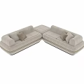 Modern Sectional Sofa with Beige Upholstery Gold Trim and Decorative Pillows