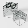 Two Modern Metal Shelving Units With Circular Hole Design For Home Storage
