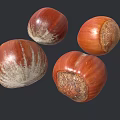 Fresh Natural Hazelnuts With Brown Textured Shells On Dark Background