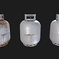 Three Industrial Propane Tanks Showing Various Degrees of Wear and Rust
