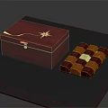 Elegant Decorative Ornament Set With Red Wooden Box Golden Decoration And Colorful Squares On Blue Tabletop