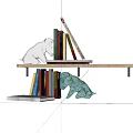 Decorative Ornament Set with White and Turquoise Dog Figurines on Wooden Shelf with Books