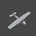 Small White Airplane With Red And Green Wing Markers On Gray Background