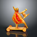 Yellow Bird Shaped Decorative Sculpture With Red Floral Patterns And Wheel Base