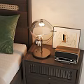 Wooden Bedside Table With Transparent Globe Lamp Vintage Radio And Abstract Painting Frame