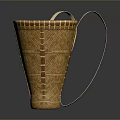 Indoor Plant in Conical Bamboo Basket with White Handles on Dark Background