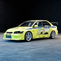 Yellow Sports Sedan With Body Decals Rear Spoiler And Sporty Exterior Design