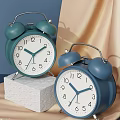 Vintage Green Blue Alarm Clocks With White Dials Black Numbers Bell Design On Stone Platform