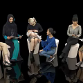Group of Diverse Women Sitting Together Reading Documents and Holding Baby