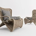 Two Rattan Leisure Chairs With Cushion And Curved Design For Indoor Outdoor Space