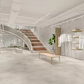 Modern Clothing Store Interior With Fashion Apparel Displays And Glass Staircase Design