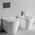 Modern Wall Mounted White Toilet and Bidet Design in Minimalist Bathroom