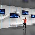 Modern Tech Exhibition Hall With Multiple Screens Red Top Person Using Smartphone Wavy White Decor