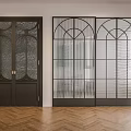 Modern Interior With Two Sliding Doors Featuring Patterned And Grid Glass Designs On Herringbone Floor