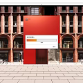 Red Storefront Facade Of Brick Building With Arched Windows And Glass Doors