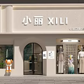 Modern XILI Women's Clothing Storefront Featuring Models Plants And Doll