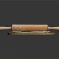 Wooden Rolling Pin on Round Board with Flour and Rolled Dough