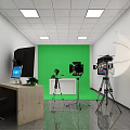 Public Office Space With Green Backdrop Photography Equipment Wooden Desk Computer Monitor And Lighting