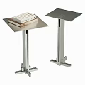 Modern Stainless Steel Side Tables with Square Top Sleek Metal Legs and Stack of Books