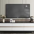 Modern TV Stand With White Black Design Gold Accents And Decorative Items
