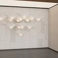 Modern Interior Space With Unique Shaped Chandelier And Geometric Wall Design
