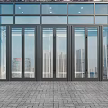 Modern Glass Bifold Doors With Black Metal Frame And Cityscape View
