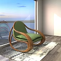 Elegant Curved Wooden Leisure Rocking Chair With Comfortable Green Cushion In Bright Seaside Living Space