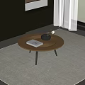 Round Wooden Coffee Table With Black Vase And White Book On Gray Carpet