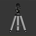 Black Telescope On Silver Tripod For Viewing Scenic Natural Landscapes