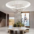 Modern Leisure Area Interior with Circular Layered Chandeliers Green Plant Centerpiece and Wooden Slat Walls