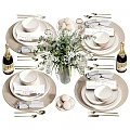 Elegant Dinnerware Set With Plates Bowls Utensils Champagne Bottles And Fresh Flower Bouquet