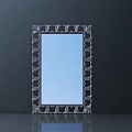 Intricate Carved Mirror Frame With Blue Glass Surface And Decorative Design