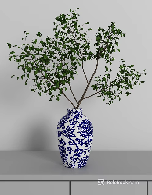 Blue and White Floral Patterned Vase with Green Leafy Branches for Home Decor 3d model 