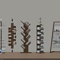 Various Bookshelves Including Upright Spiral With Small Decor Magazines Against Light Colored Wall Wooden Floor
