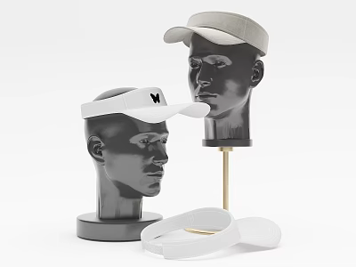White Visor with W Logo and Gray Baseball Cap Displayed on Mannequin Heads 3d model