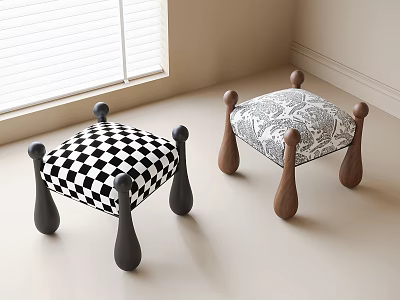 Black and white checkered and patterned stools with black and brown legs in indoor room 3d model
