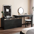 Black Bedroom Dresser With Drawers Round Mirror Chair White Cushion Decorative Items and Potted Plant